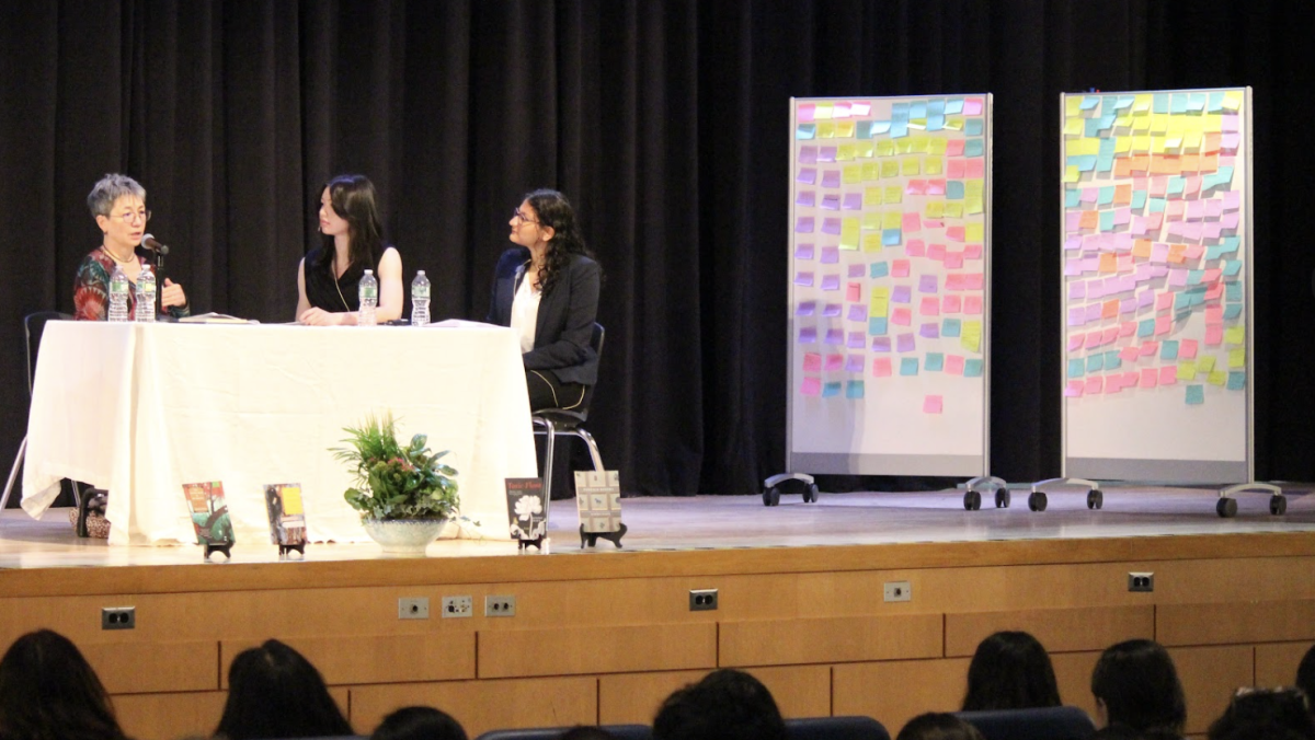 Seniors Linda Cheung and Safiya Hamdani, who helped to organize the event, sit before their classmates with Kimiko Hahn to inquire about and discuss poetry.